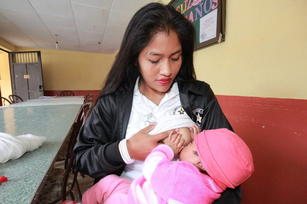 Woman breastfeeding a baby