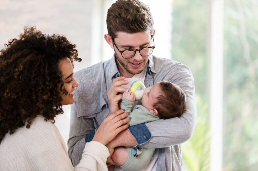 Combination Feeding: The Solution for Every Busy Mom 3 Young Dad feeds newborn son