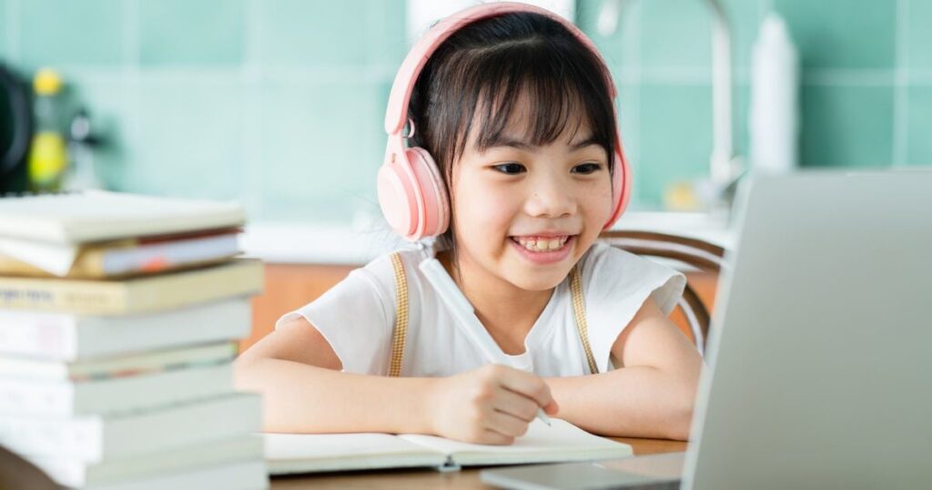 How Much Screen Time Is Too Much for your Kid? 7 Child studying on laptop